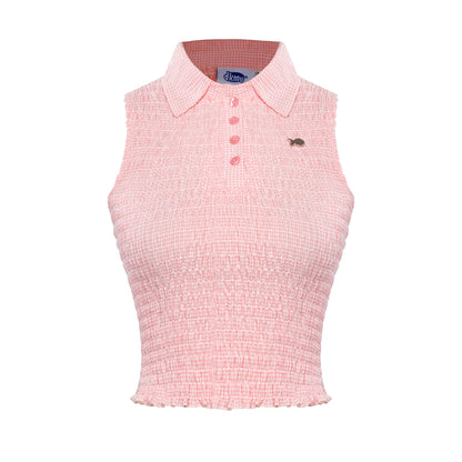 Pink checkered sleeveless top with collar on a white background
