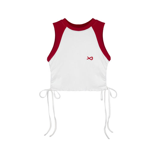 White sleeveless top with red shoulders and a small logo on a white background