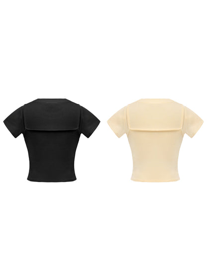 Black and beige crop top on a white background