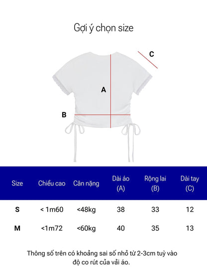 White crop top with size chart on a white background