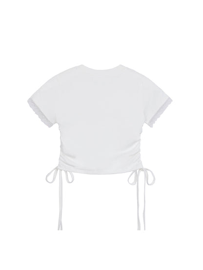 White crop top with tie details on a white background
