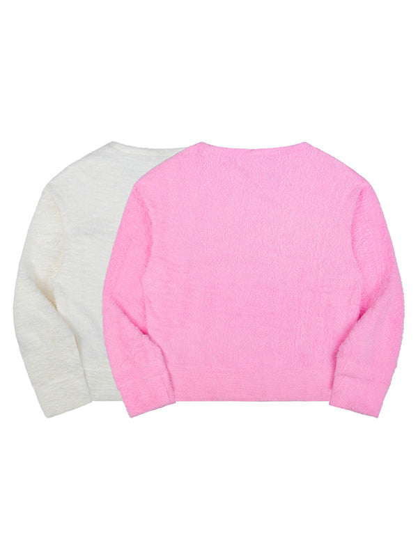 Two cropped sweatshirts, one white and one pink, on a white background