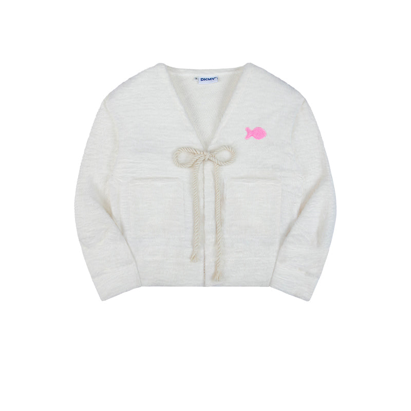 White cardigan with a pink fish design on a white background