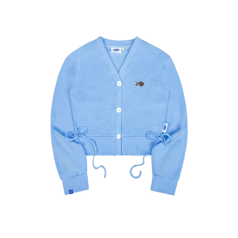 Light blue cardigan with white buttons on a white background