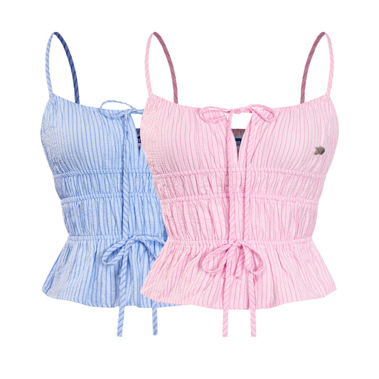 Two crop tops, one pink and one blue, on a white background