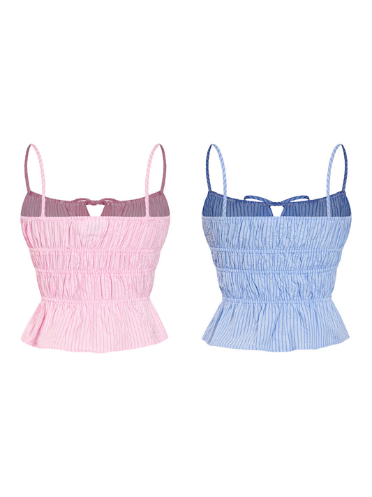 Two crop tops, one pink and one blue, on a white background