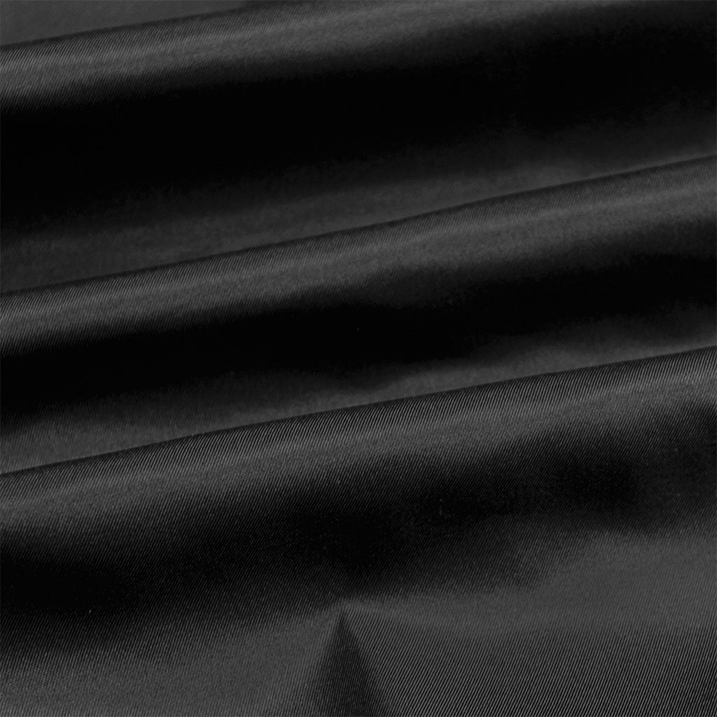 Close-up of black fabric with folds