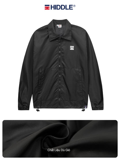 Black jacket with Hiddle logo on a white background
