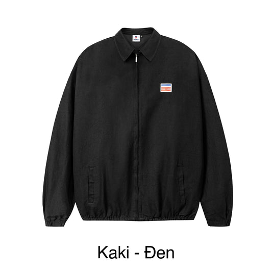 Black jacket with a small logo on a white background