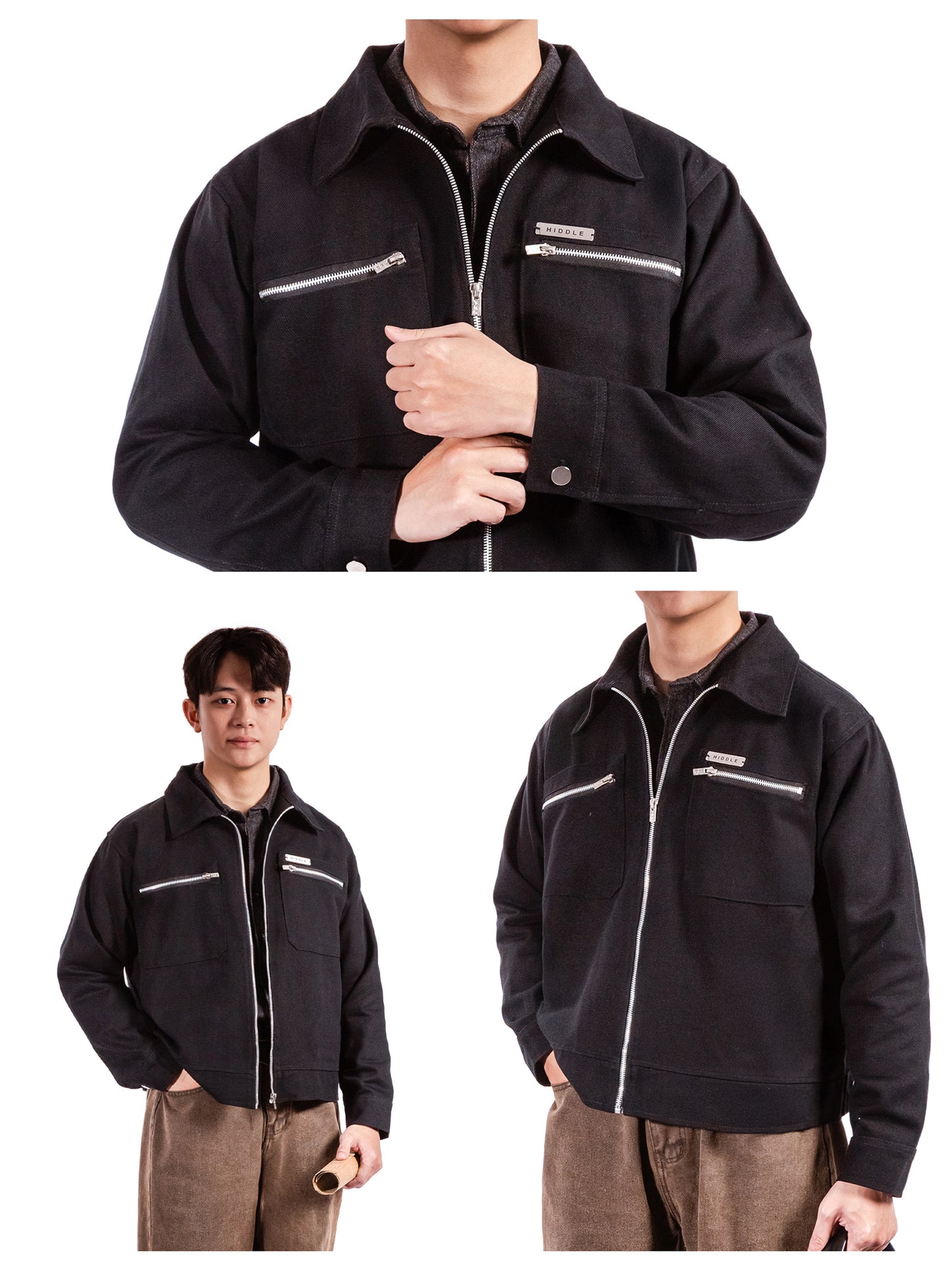 Black jacket with white zippers worn by a person on a white background