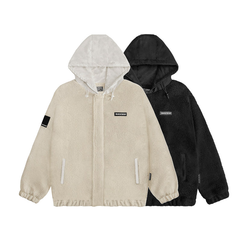 Beige and black hoodies with brand logos on a white background