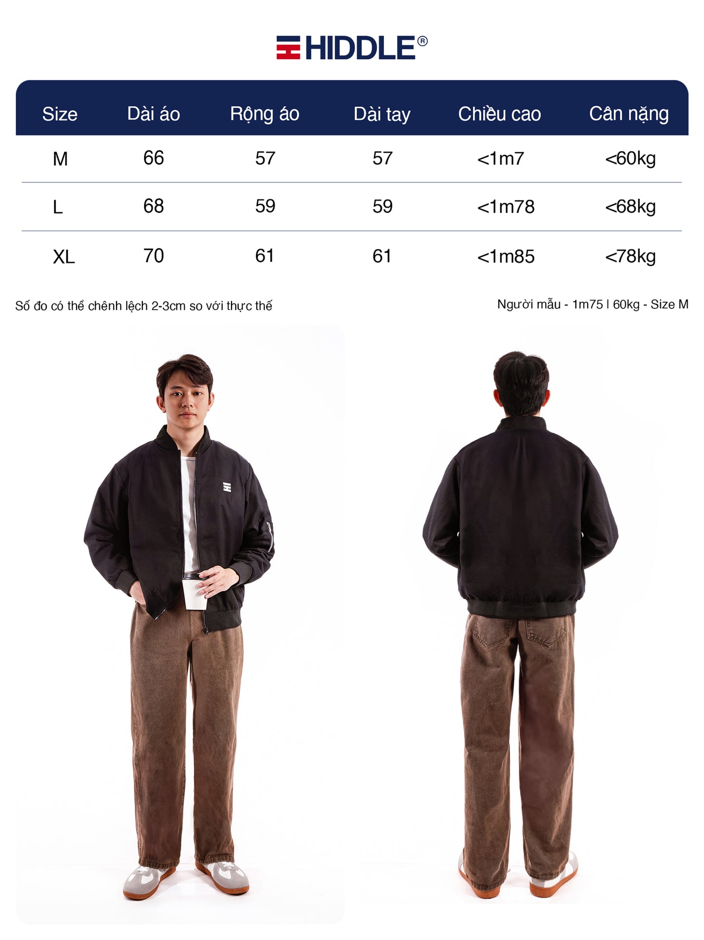 Person wearing a black jacket and brown pants with size chart on a white background