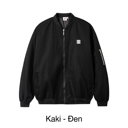 Black jacket with a small logo on the chest against a white background