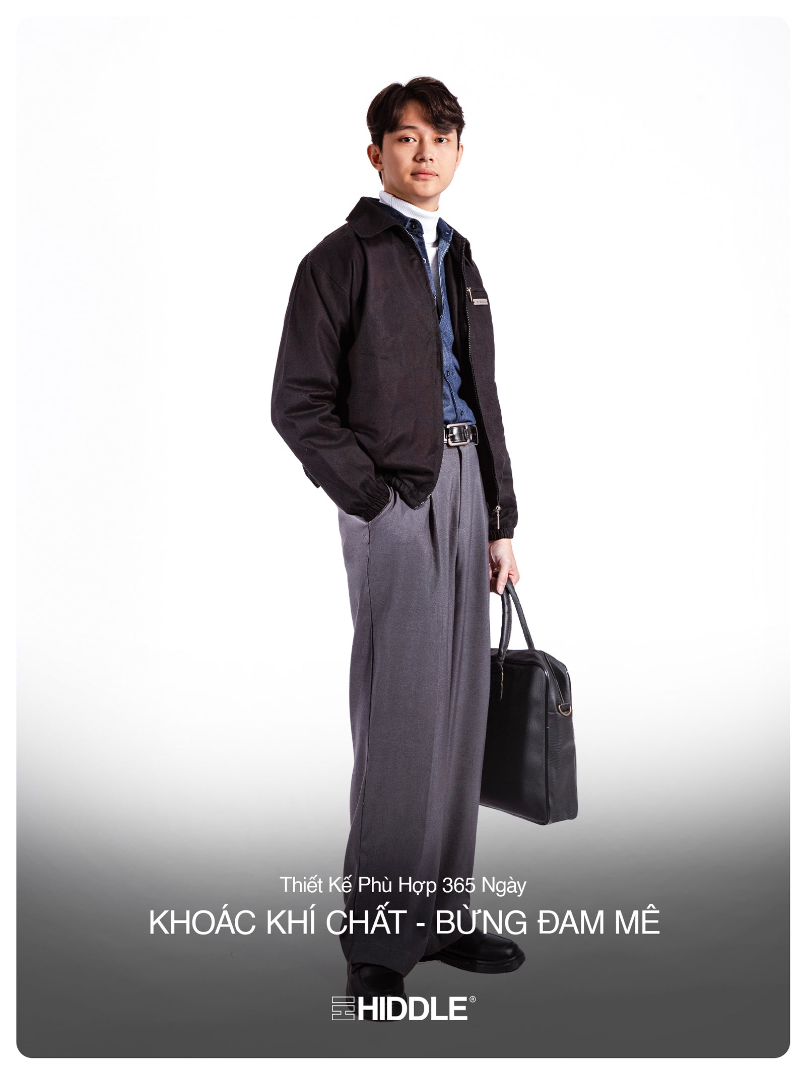 Man in formal attire holding a briefcase with Hiddle branding.