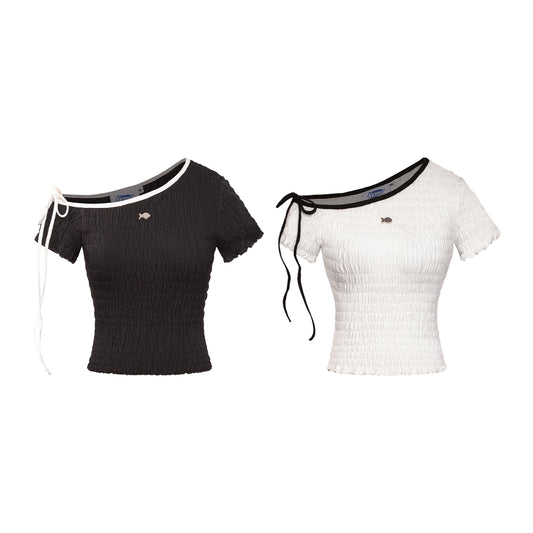 Black and white short-sleeve tops with unique cut-out shoulders on a white background