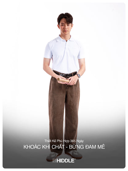 Man wearing a white shirt and brown pants on a white background