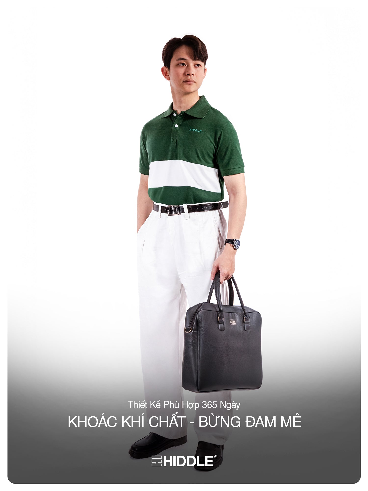 Man in green and white polo shirt holding a black briefcase on a white background