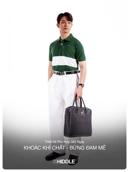 Man in green and white polo shirt holding a black briefcase on a white background