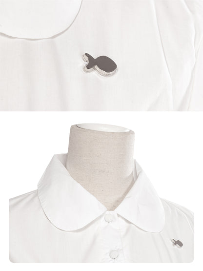 White polo shirt with a small logo on a mannequin against a white background