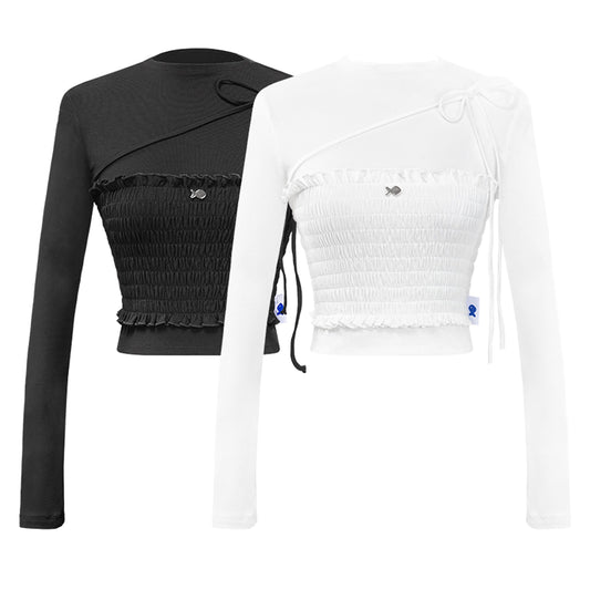 Black and white long-sleeve crop tops with smocked details on a white background