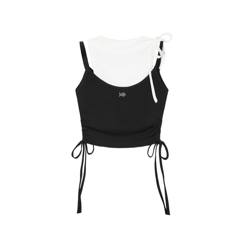 Black and white crop top with drawstring details on a white background