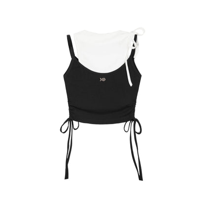 Black and white crop top with drawstring details on a white background