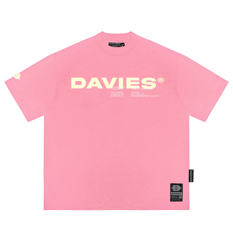 Pink t-shirt with 'DAVIES' logo on a white background