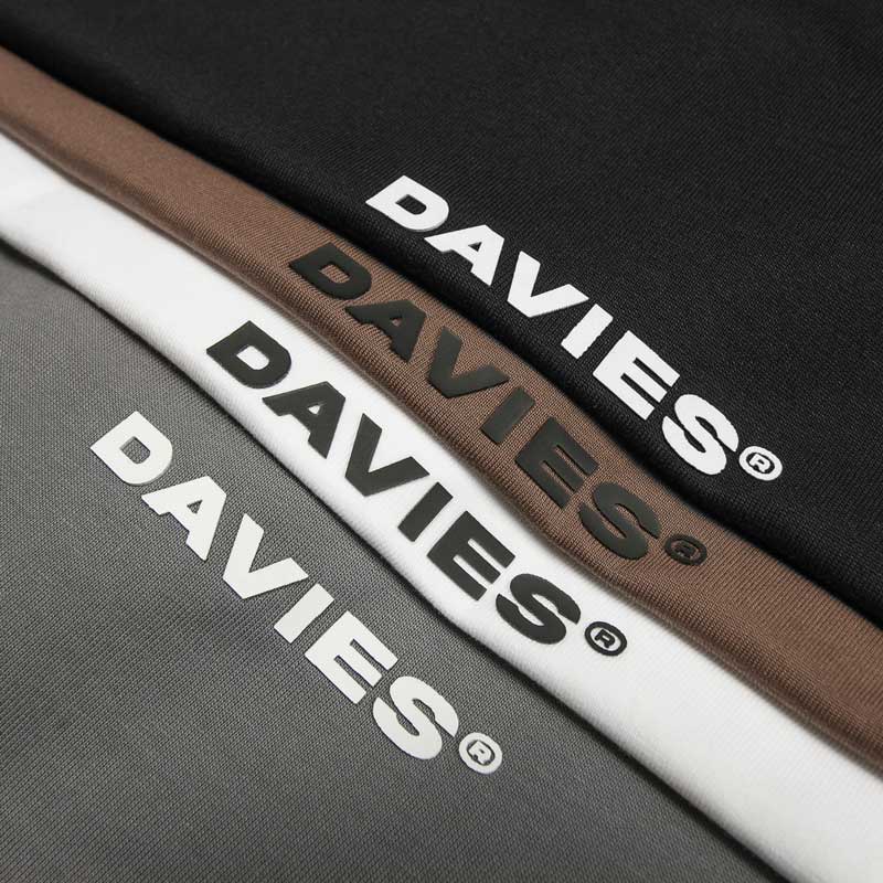 Close-up of Davies brand logos on various materials.