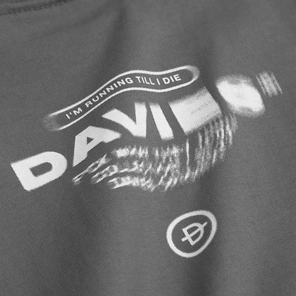Gray t-shirt with 'I'm Running Till I Die' and 'DAVID' text on a dark background