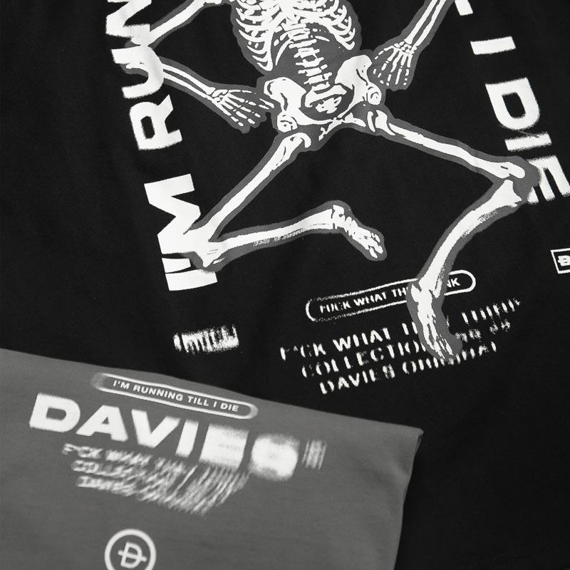 Black t-shirt with skeleton design and text, featuring the brand 'Davies'.