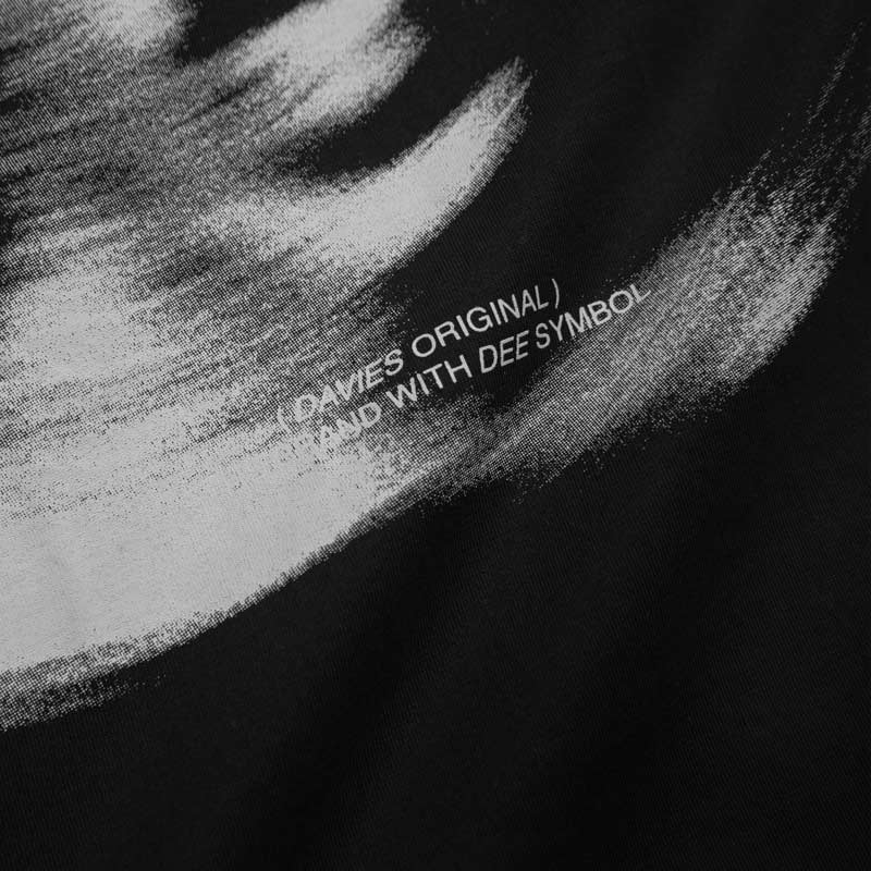Black and white abstract design with text on a textured background