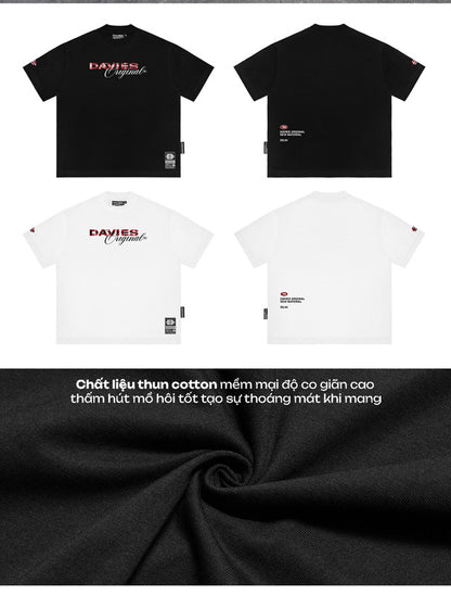 Black and white t-shirts with 'DAVIES' branding on a dark fabric background.