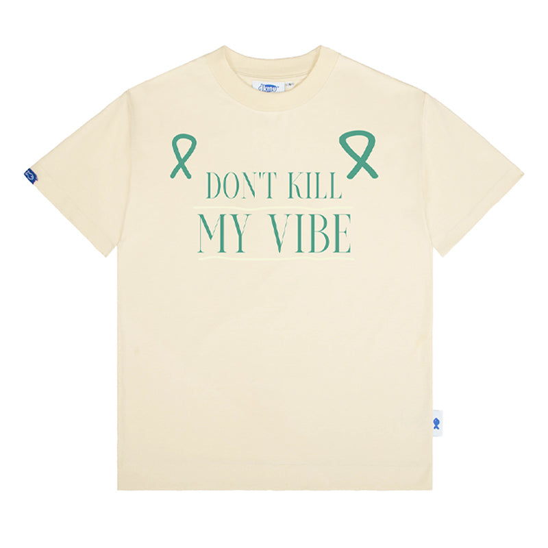 Beige t-shirt with 'Don't Kill My Vibe' text and teal ribbons on a white background