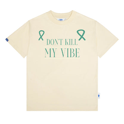 Beige t-shirt with 'Don't Kill My Vibe' text and teal ribbons on a white background