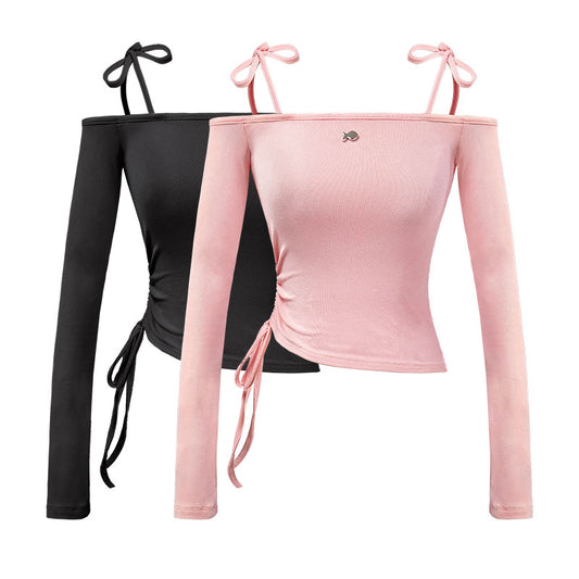 Black and pink long-sleeve crop tops with tie details on a white background