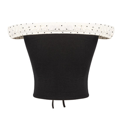 Black waist trainer with white polka dot trim on a white background
