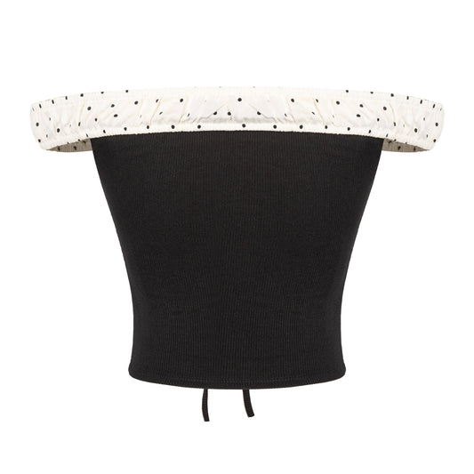 Black waist trainer with white polka dot trim on a white background