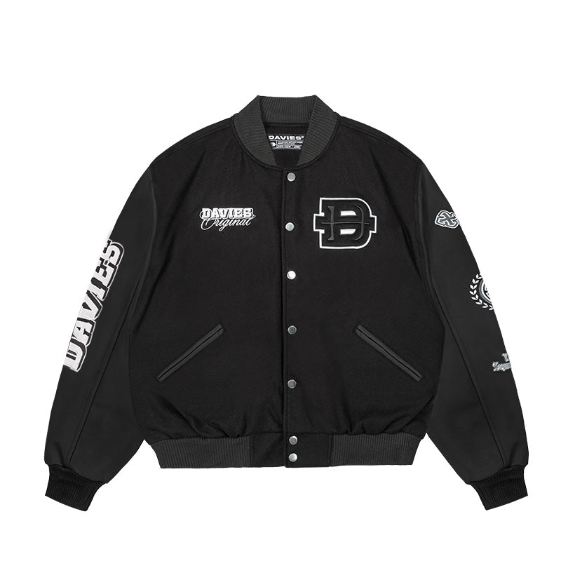 Black varsity jacket with branding on a white background