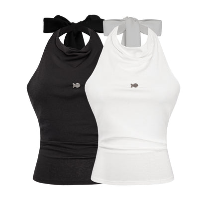 Black and white tank tops with bow details on a white background
