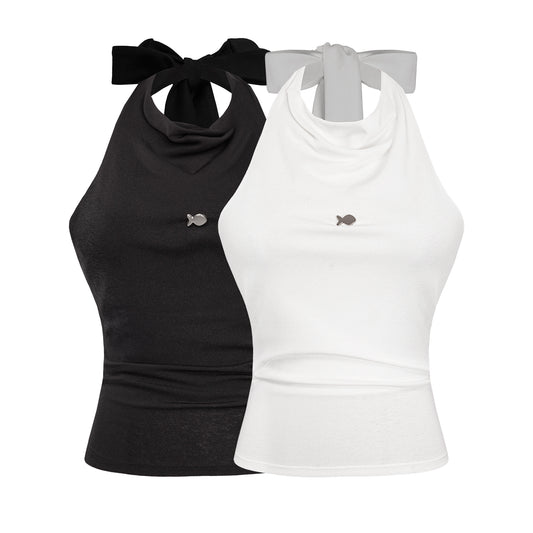 Black and white tank tops with bow details on a white background