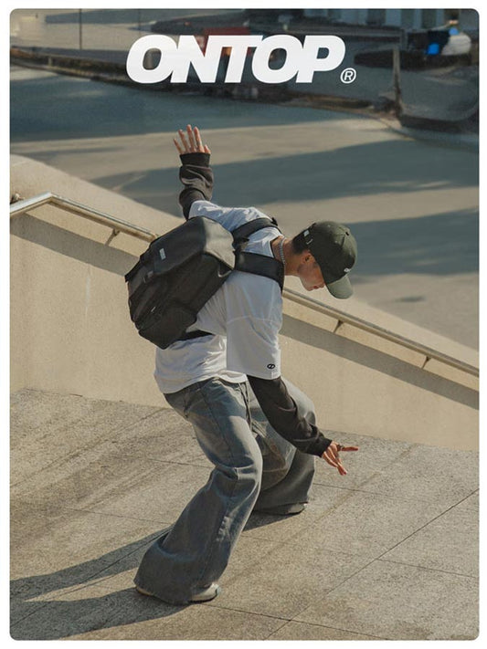 Person skateboarding with 'ONTOP' branding in the background