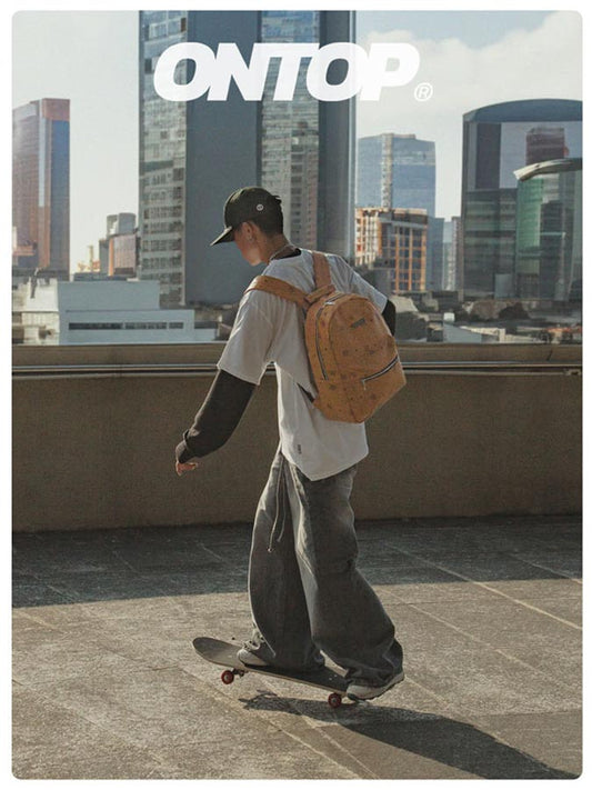Person skateboarding on a rooftop with a cityscape background and 'ONTOP' branding.
