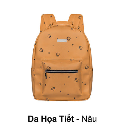 Orange backpack with star patterns on a white background