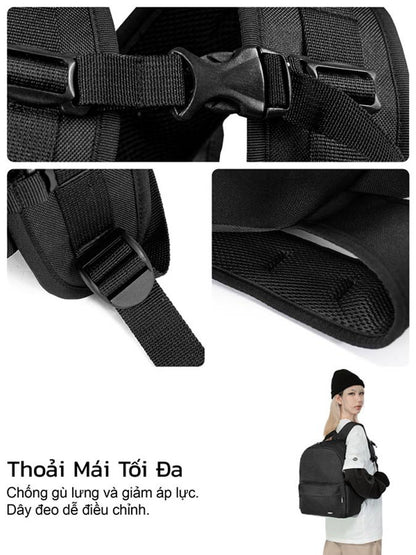 Black backpack with adjustable straps and a person wearing it.
