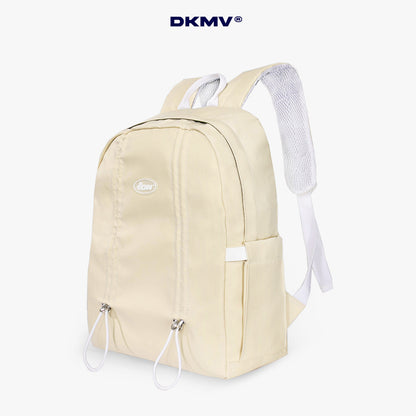 Beige backpack with white straps on a white background, featuring the brand 'DKMV'.