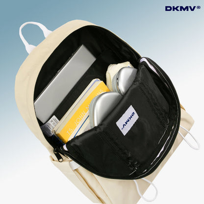 Beige backpack with a black compartment containing a laptop, notebook, and phone, on a light blue background with DKMV branding.