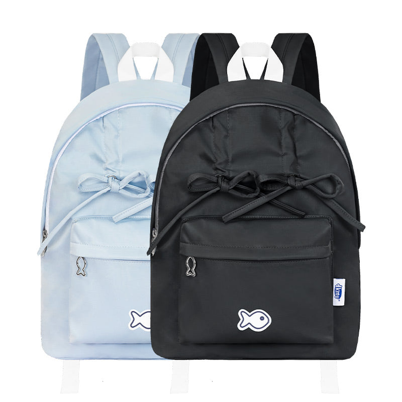 Two backpacks, one black and one light blue, with fish designs on a white background.