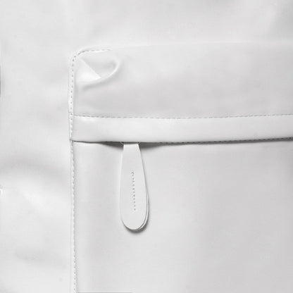 Close-up of a white leather bag with a strap on a light gray background