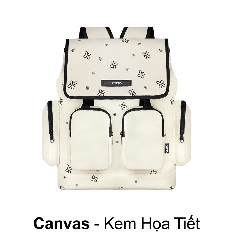 White backpack with black floral patterns on a white background