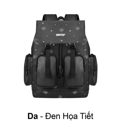 Black backpack with decorative elements on a white background